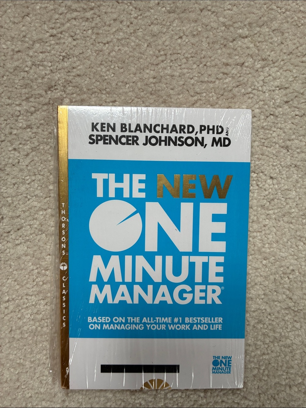 The New One Minute Manager by Ken Blanchard & Spencer Johnson - Blue & White